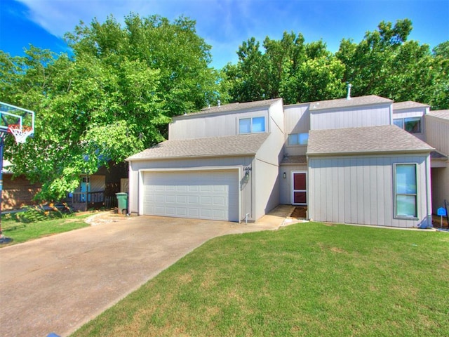 1404 Mary Lee Ln, Edmond, OK 73034 - mid-century modern home with concrete driveway, an attached garage, a shingled roof, and a front lawn