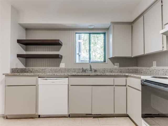 1404 Mary Lee Ln, Edmond, OK 73034 - kitchen featuring white dishwasher, range, open shelves, and light stone countertops