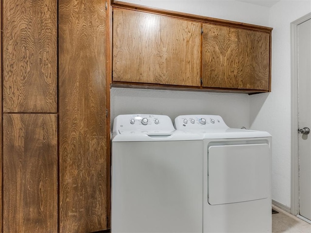 1404 Mary Lee Ln, Edmond, OK 73034 - washroom featuring washing machine and dryer and cabinet space