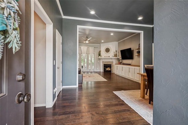 1241 NW 183rd St, Edmond, OK 73012 - foyer with ornamental molding, hardwood / wood-style floors, ceiling fan, a fireplace, and a textured wall
