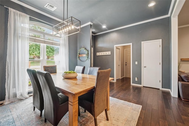 1241 NW 183rd St, Edmond, OK 73012 - dining space with crown molding, hardwood / wood-style flooring, a chandelier, and recessed lighting