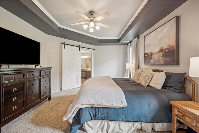1241 NW 183rd St, Edmond, OK 73012 - bedroom featuring light carpet, a barn door, a tray ceiling, crown molding, and ensuite bathroom