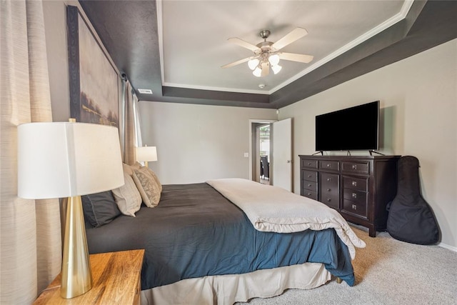 1241 NW 183rd St, Edmond, OK 73012 - carpeted bedroom featuring a raised ceiling, crown molding, and ceiling fan