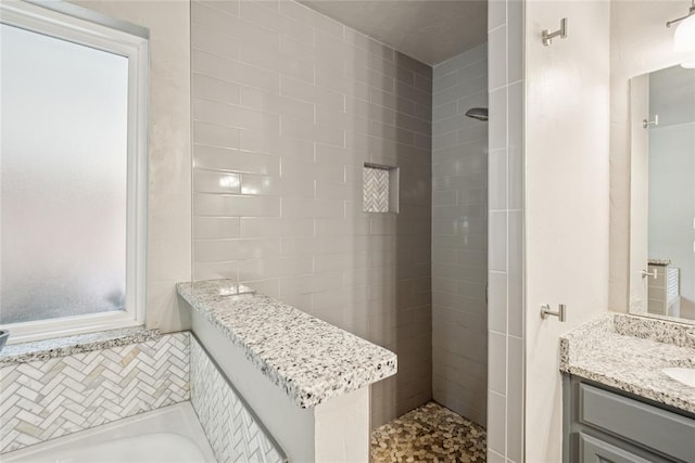 1241 NW 183rd St, Edmond, OK 73012 - bathroom featuring a bath, tiled shower, and vanity
