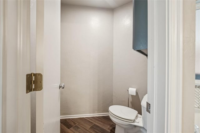 1241 NW 183rd St, Edmond, OK 73012 - bathroom featuring wood finished floors and toilet