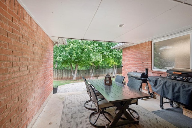 1241 NW 183rd St, Edmond, OK 73012 - view of patio featuring a grill and outdoor dining space