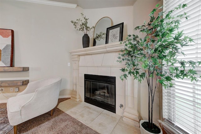 9909 Summerhill Ln, Yukon, OK 73099 - living area featuring a tiled fireplace, plenty of natural light, and light tile patterned floors