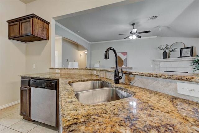 9909 Summerhill Ln, Yukon, OK 73099 - kitchen with dishwasher, light stone countertops, a ceiling fan, light tile patterned flooring, and lofted ceiling