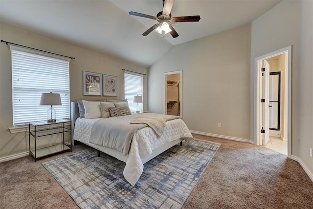 9909 Summerhill Ln, Yukon, OK 73099 - carpeted bedroom featuring a spacious closet, lofted ceiling, connected bathroom, and a ceiling fan