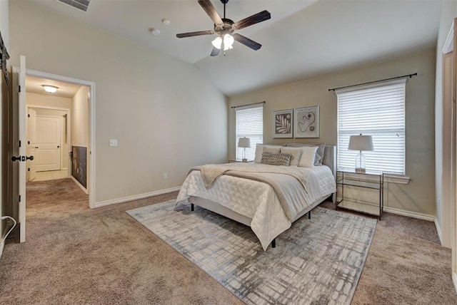 9909 Summerhill Ln, Yukon, OK 73099 - carpeted bedroom with vaulted ceiling and ceiling fan