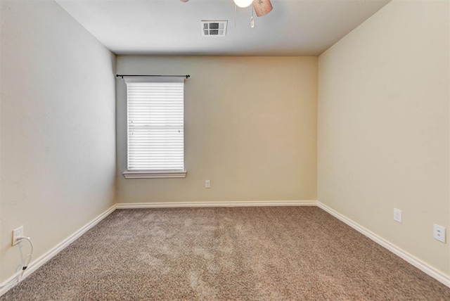 9909 Summerhill Ln, Yukon, OK 73099 - spare room featuring a ceiling fan and carpet