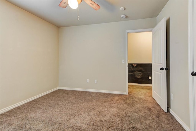 9909 Summerhill Ln, Yukon, OK 73099 - unfurnished room featuring carpet floors, ceiling fan, and a smoke detector