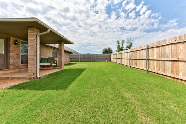 9909 Summerhill Ln, Yukon, OK 73099 - fenced backyard featuring a patio