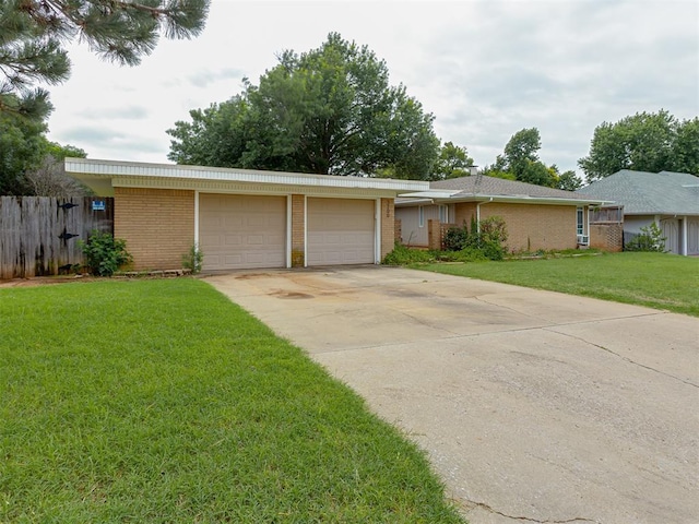 3700 N Edgewater Dr, Oklahoma City, OK 73116 - ranch-style home featuring brick siding and a garage