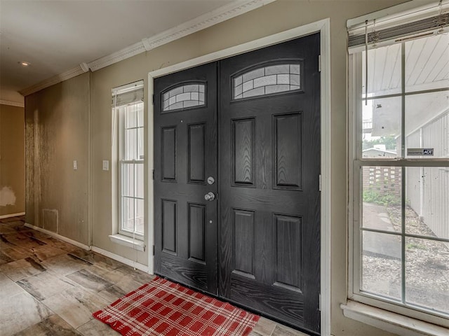 3700 N Edgewater Dr, Oklahoma City, OK 73116 - foyer featuring crown molding and baseboards