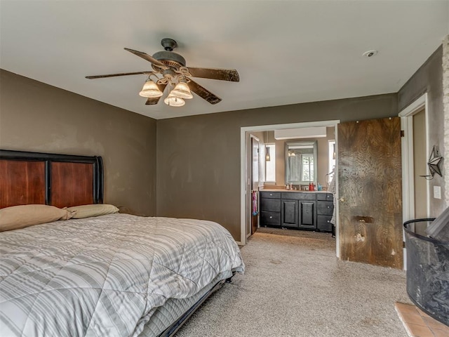 3700 N Edgewater Dr, Oklahoma City, OK 73116 - bedroom featuring light carpet, ceiling fan, and ensuite bathroom