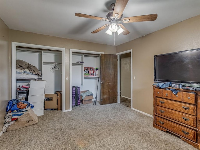 3700 N Edgewater Dr, Oklahoma City, OK 73116 - bedroom featuring carpet floors, multiple closets, and a ceiling fan