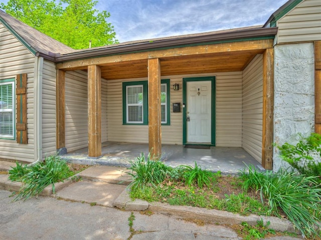 531 NW 48th St, Oklahoma City, OK 73118 - view of exterior entry with a porch