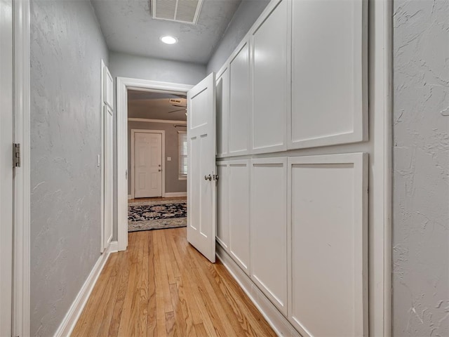 531 NW 48th St, Oklahoma City, OK 73118 - hall featuring light wood-type flooring, a textured wall, and recessed lighting