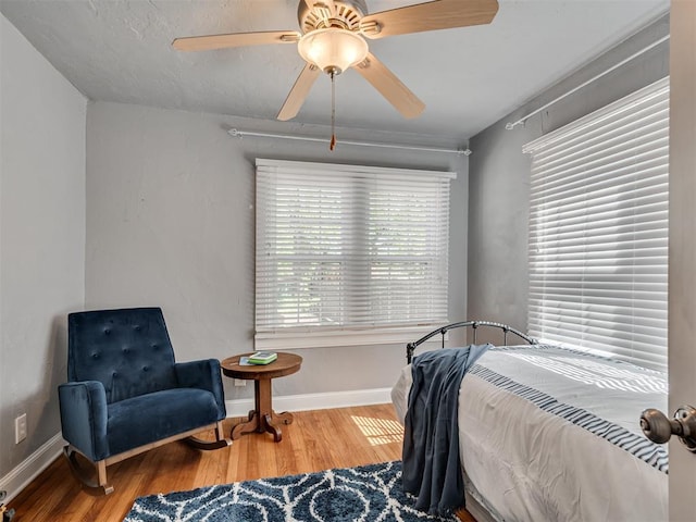 531 NW 48th St, Oklahoma City, OK 73118 - bedroom featuring wood finished floors and a ceiling fan