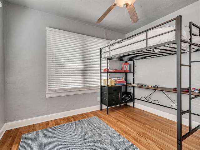 531 NW 48th St, Oklahoma City, OK 73118 - bedroom with wood finished floors and ceiling fan
