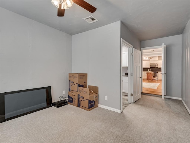 531 NW 48th St, Oklahoma City, OK 73118 - unfurnished bedroom with carpet flooring and a ceiling fan