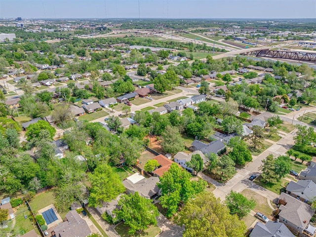 531 NW 48th St, Oklahoma City, OK 73118 - aerial overview of property's location with a notable bridge and nearby suburban area