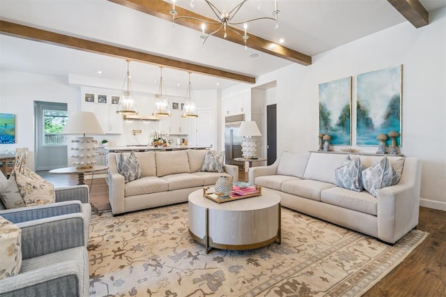 1415 Sherwood Ln, Nichols Hills, OK 73116 - living room with a chandelier, beamed ceiling, wood finished floors, and recessed lighting
