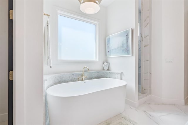 1415 Sherwood Ln, Nichols Hills, OK 73116 - bathroom with a freestanding tub, marble finish floors, and a shower