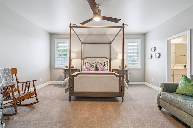 1415 Sherwood Ln, Nichols Hills, OK 73116 - carpeted bedroom with baseboards and ensuite bathroom