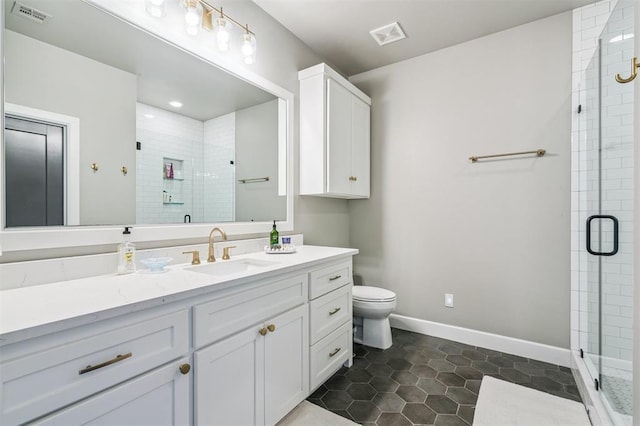 1415 Sherwood Ln, Nichols Hills, OK 73116 - bathroom featuring a stall shower, vanity, and tile patterned floors
