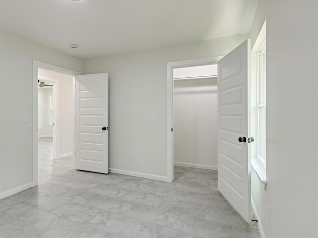 1609 NE 26th St, Oklahoma City, OK 73111 - unfurnished bedroom with a spacious closet and baseboards