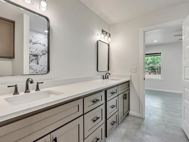 1609 NE 26th St, Oklahoma City, OK 73111 - bathroom with double vanity and baseboards