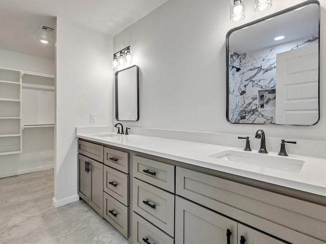 1609 NE 26th St, Oklahoma City, OK 73111 - bathroom with double vanity and a walk in closet