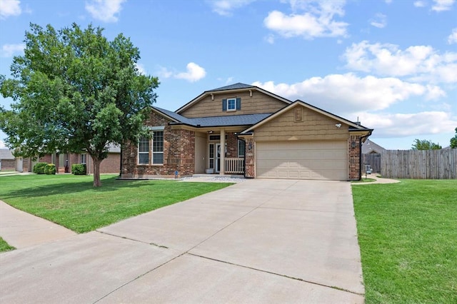 18200 Allora Dr, Edmond, OK 73012 - craftsman house featuring driveway, an attached garage, and brick siding