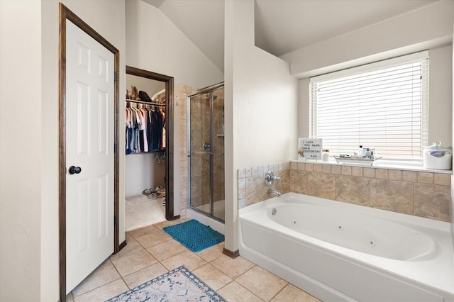 18200 Allora Dr, Edmond, OK 73012 - bathroom featuring a whirlpool tub, a shower stall, tile patterned flooring, a spacious closet, and vaulted ceiling