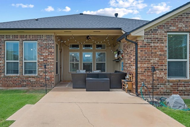 18200 Allora Dr, Edmond, OK 73012 - property entrance featuring outdoor lounge area, a patio, and brick siding