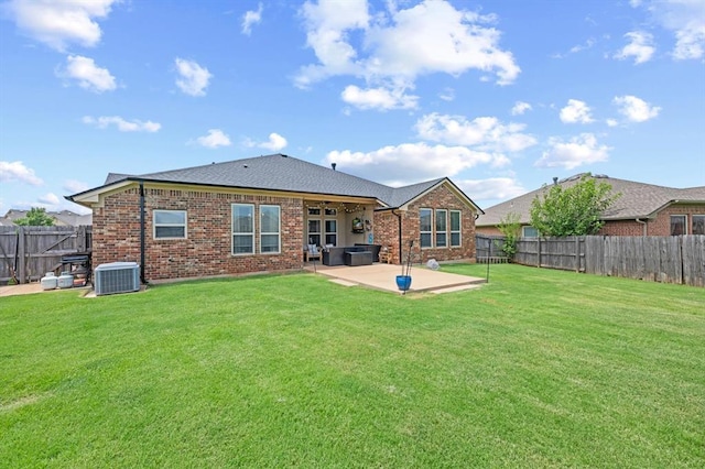 18200 Allora Dr, Edmond, OK 73012 - rear view of house with a patio, a fenced backyard, and brick siding