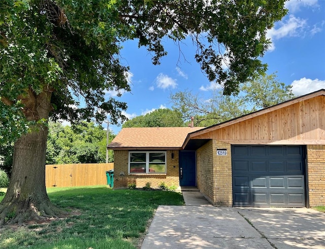 12519 SW 2nd St, Yukon, OK 73099 - view of front of home featuring brick siding, an attached garage, and concrete driveway