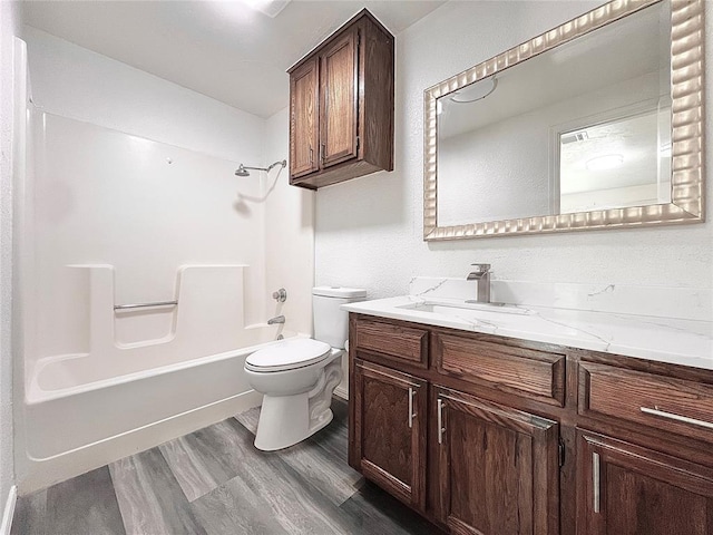 12519 SW 2nd St, Yukon, OK 73099 - full bathroom with vanity, shower / tub combination, and wood finished floors