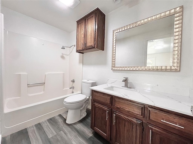 12519 SW 2nd St, Yukon, OK 73099 - bathroom featuring vanity, shower / washtub combination, and wood finished floors