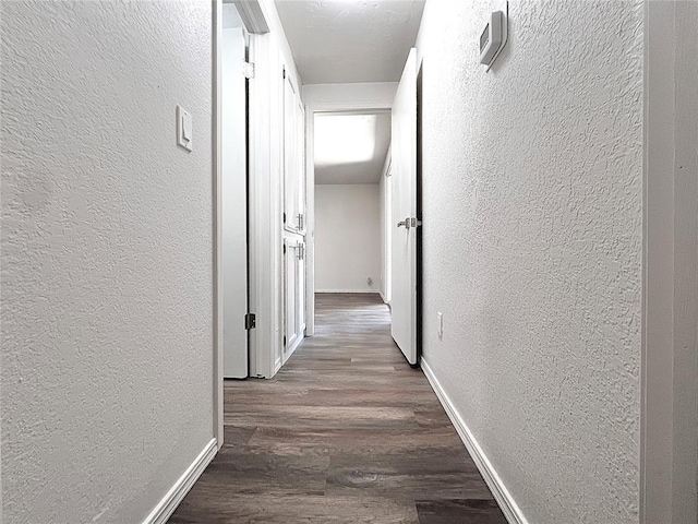 12517 SW 2nd St, Yukon, OK 73099 - corridor featuring a textured wall and wood finished floors