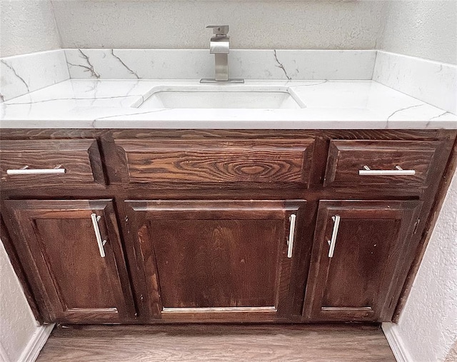 12517 SW 2nd St, Yukon, OK 73099 - detailed view of a textured wall and wood finished floors