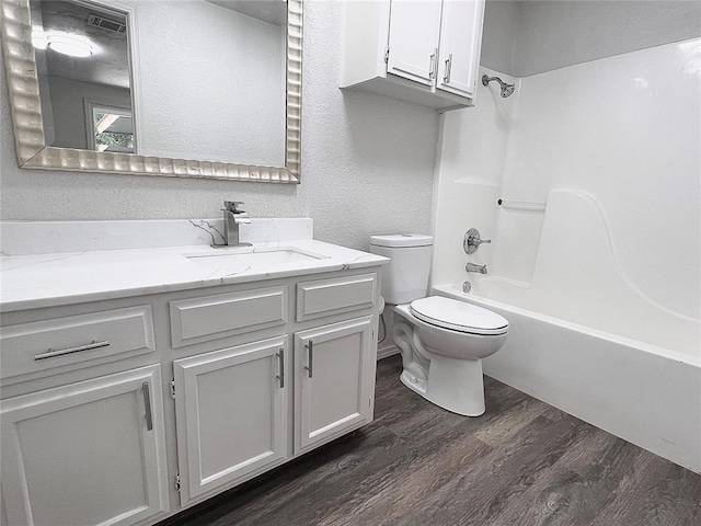 12517 SW 2nd St, Yukon, OK 73099 - full bath with vanity, wood finished floors, and bathing tub / shower combination