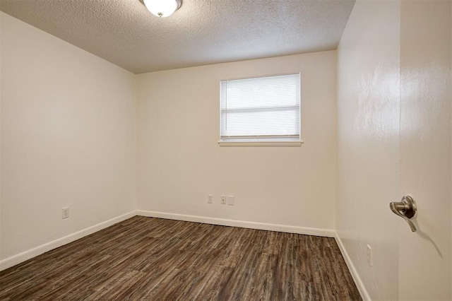 4025 Parkwoods Ln, Midwest City, OK 73110 - unfurnished room with wood finished floors and a textured ceiling