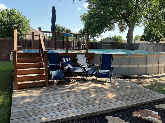 10201 Pinckney Ct, Oklahoma City, OK 73162 - wooden terrace featuring a fenced backyard