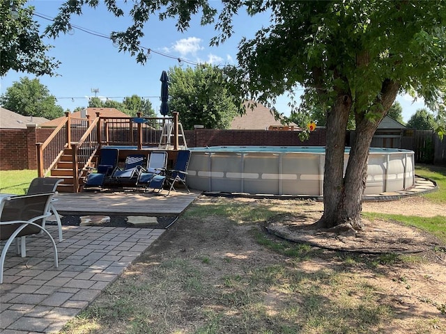 10201 Pinckney Ct, Oklahoma City, OK 73162 - view of yard featuring a wooden deck and stairway