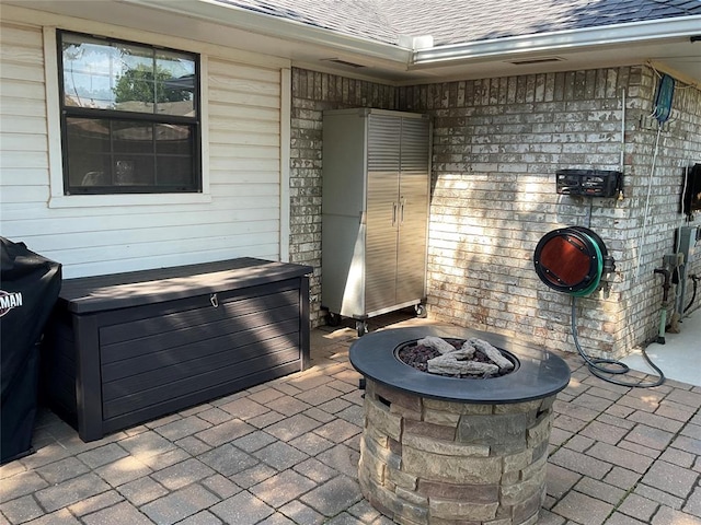 10201 Pinckney Ct, Oklahoma City, OK 73162 - view of patio with a fire pit and a hot tub
