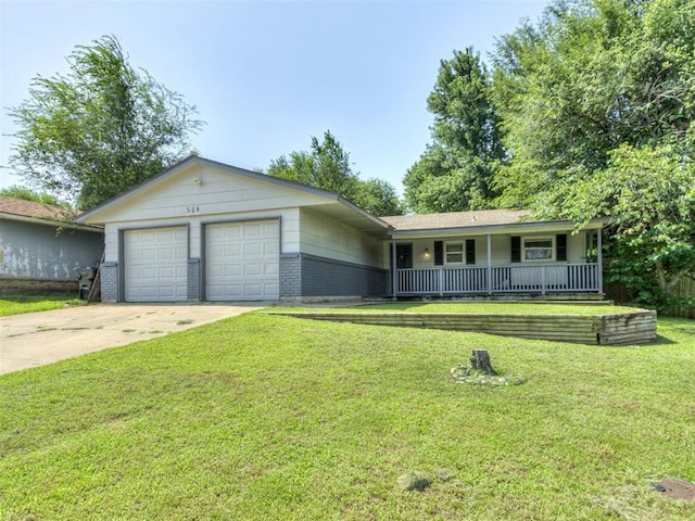 528 Sweetbough St, Jones, OK 73049 - ranch-style house with covered porch, an attached garage, brick siding, driveway, and a front yard