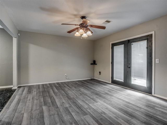 528 Sweetbough St, Jones, OK 73049 - spare room featuring french doors, ceiling fan, and wood finished floors